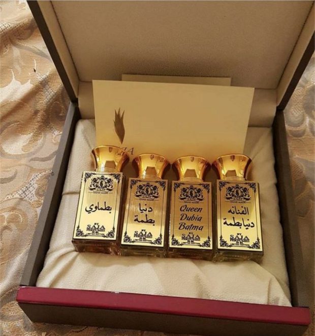 بالصحة والراحة.. دنيا بطمة تتلقى قنينات عطر باسمها