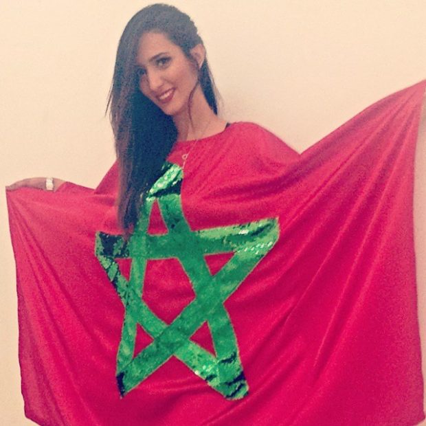 عيد الاستقلال.. ملكة جمال العرب ترتدي العلم المغربي